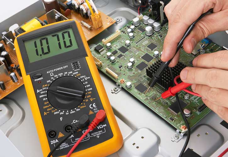 Multimeter testing PCB