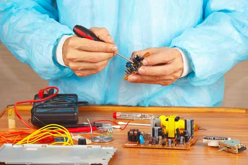 Technician Fixing Circuit Board